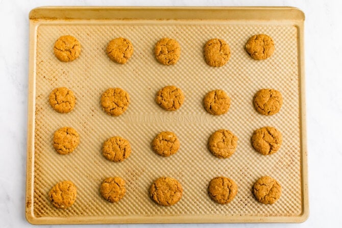 Do-si-do peanut butter cookies on a cookie sheet.