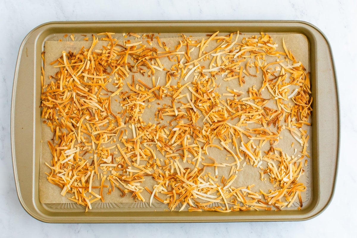 Sheet pan with toasted coconut flakes.