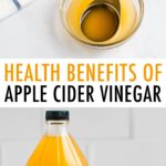 Bottle of apple cider vinegar and a measuring spoon in a small bowl of apple cider vinegar.