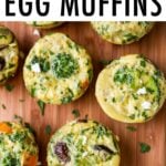 Veggie egg muffins on a wood board.