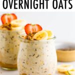 Two jars of overnight oats. The bottom as peanut butter and it's topped with fruit and granola.