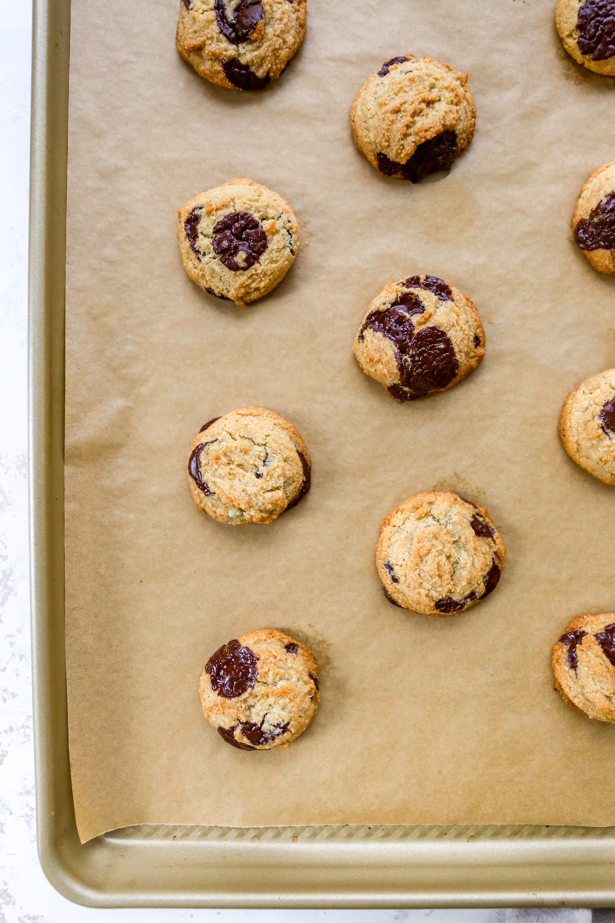 Chocolate chip cookies on a baking sheet.