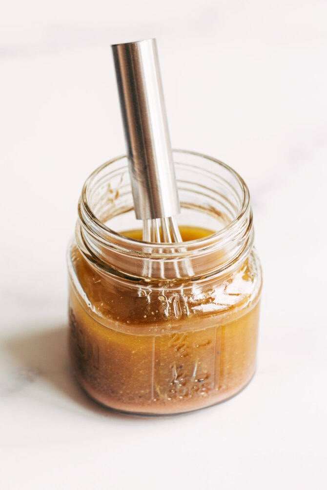 Whisk in a jar of red wine vinaigrette.