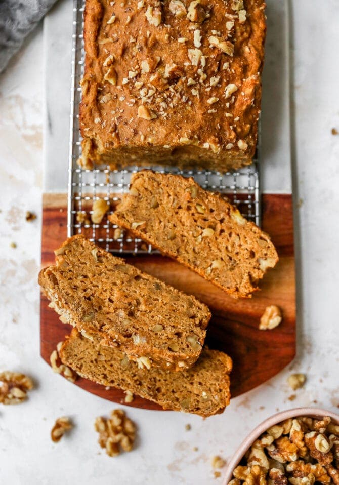 Loaf of banana bread with slices taken out of it.