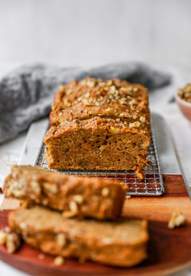 Loaf of banana bread with slices taken out of it.