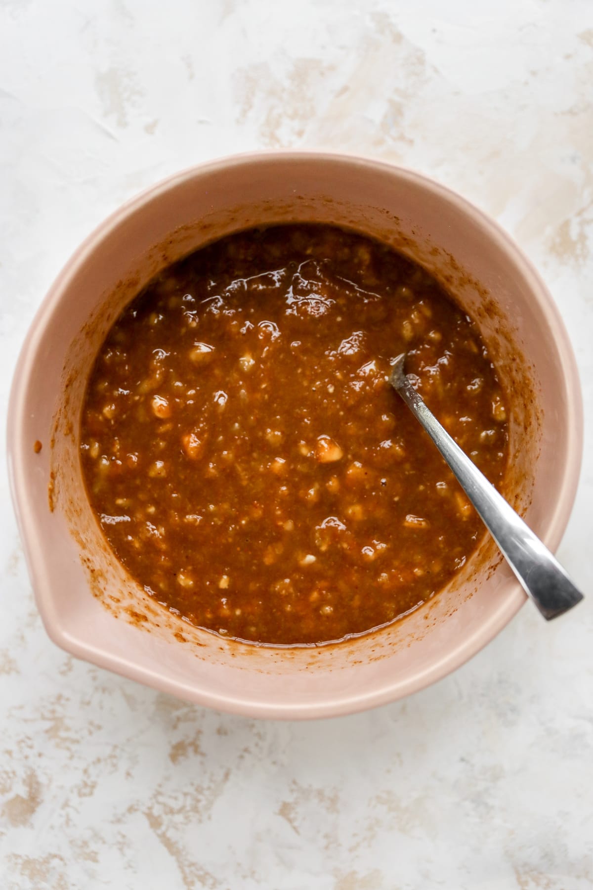 Mixing bowl with banana bread batter.