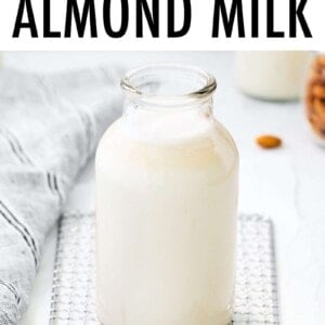 Glass bottle of homemade almond milk.