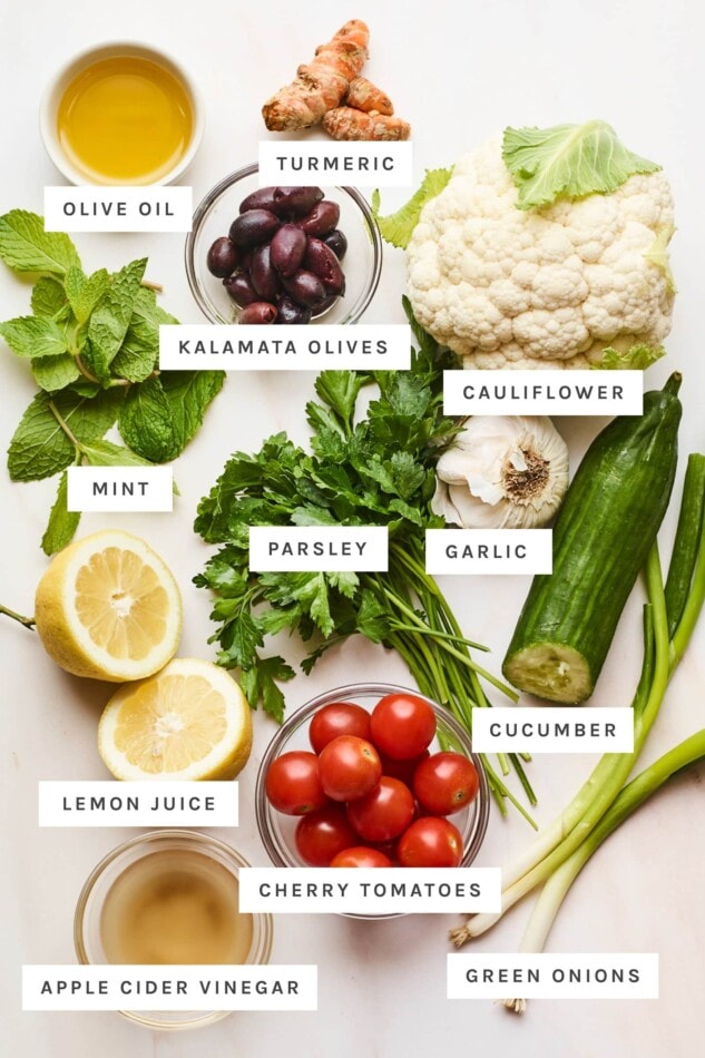 Ingredients to make cauliflower tabbouleh with text labels.