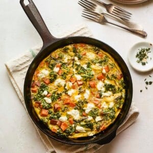 Sweet potato kale goat cheese frittata in a skillet.