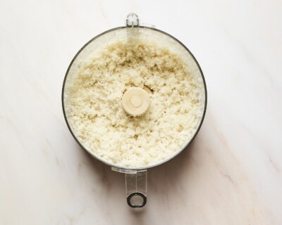 Cauliflower rice in a food processor.