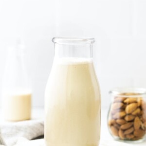 Glass bottle of macadamia milk.