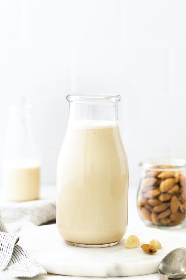 Glass bottle of macadamia milk.