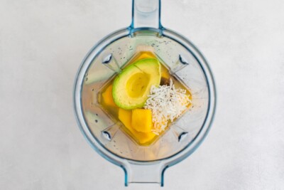 Blender with avocado, coconut, mango and dates.