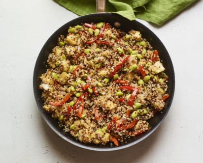 Skillet with pineapple fried quinoa.