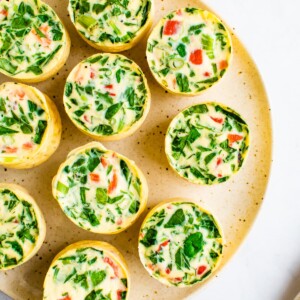 Veggie egg white bites on a plate.