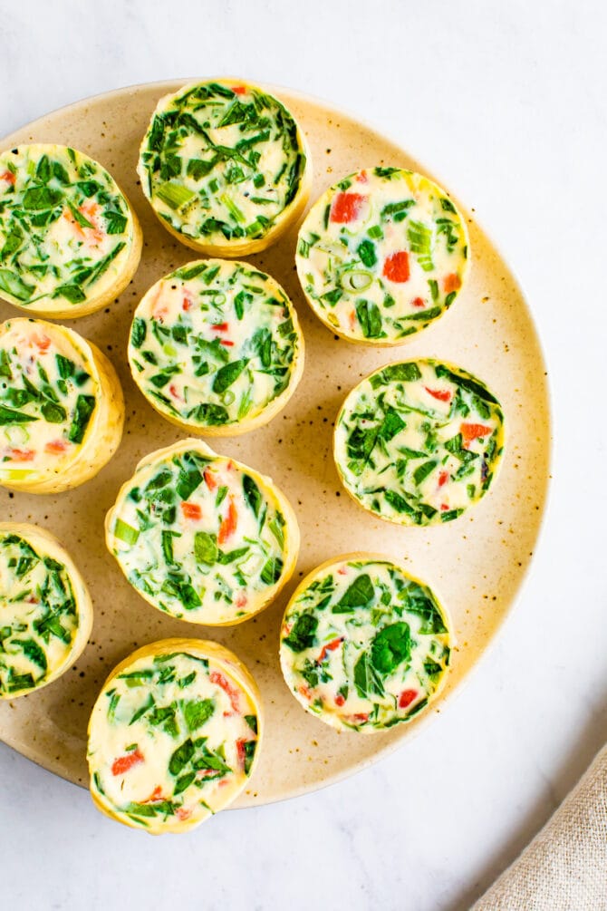 Veggie egg white bites on a plate.