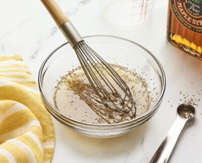 Whisk in a bowl of apple cider vinegar coleslaw.