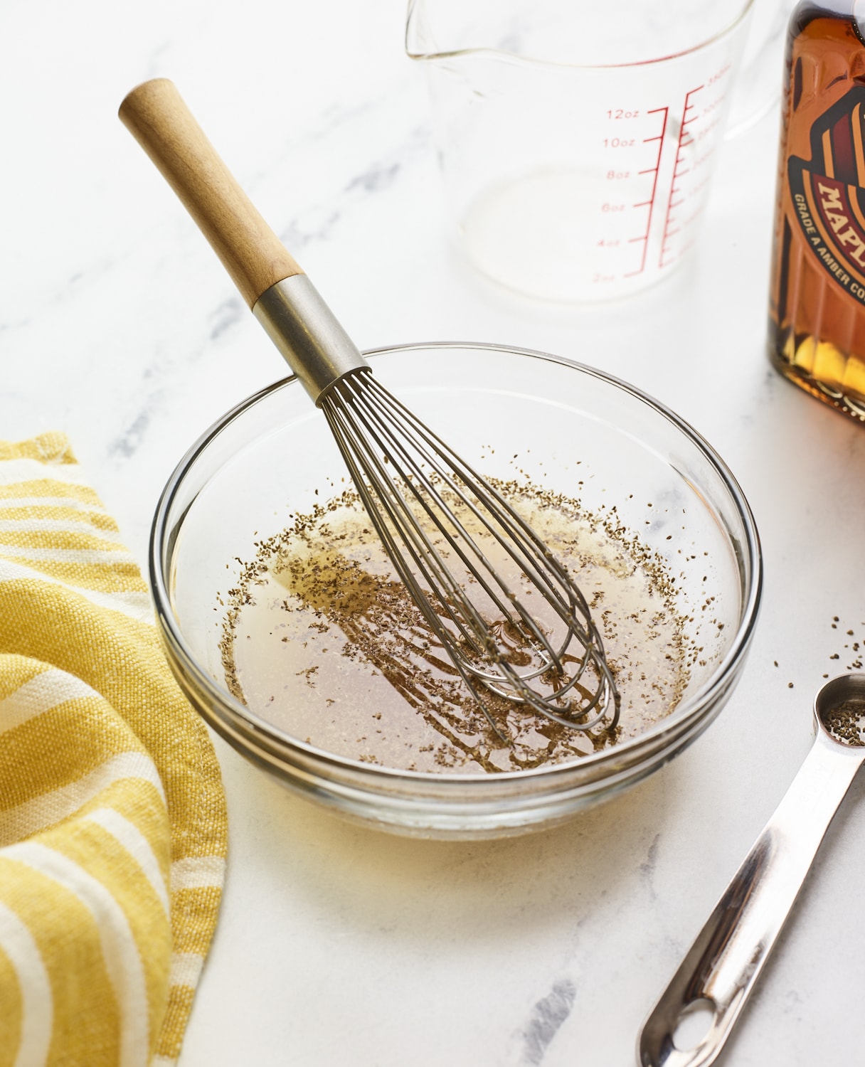 Whisk in a bowl of apple cider vinegar coleslaw.