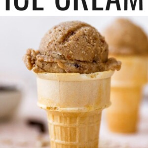 Scoop of oatmeal raisin banana ice cream in a cake cone.