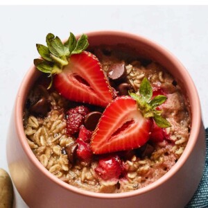 Bowl of strawberry chocolate chip baked oatmeal.