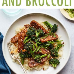 Plate of teriyaki tempeh and broccoli served over rice.