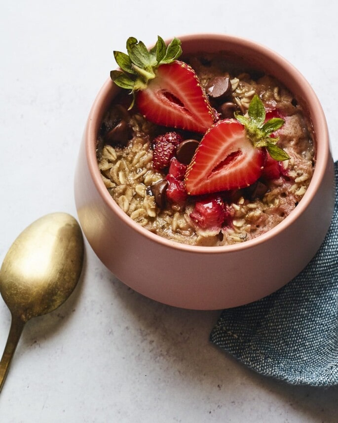 Bowl of strawberry chocolate chip baked oatmeal.