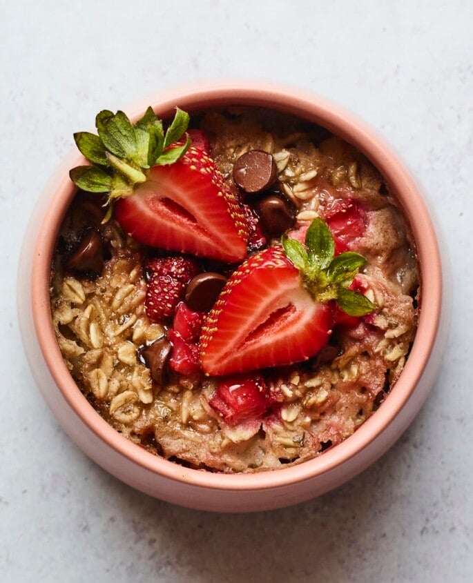 Bowl of strawberry chocolate chip baked oatmeal.