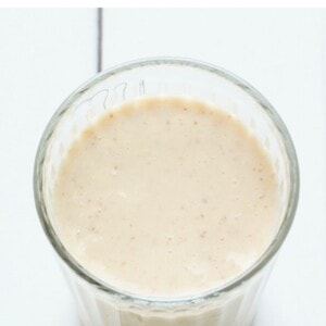Glass of a banana protein shake.