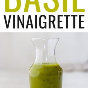 Jar of basil vinaigrette.