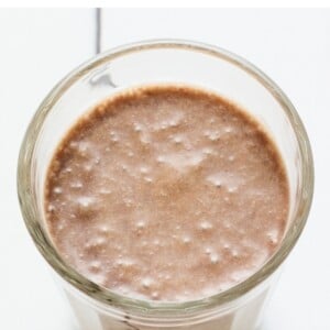 Coffee protein shake in a glass.