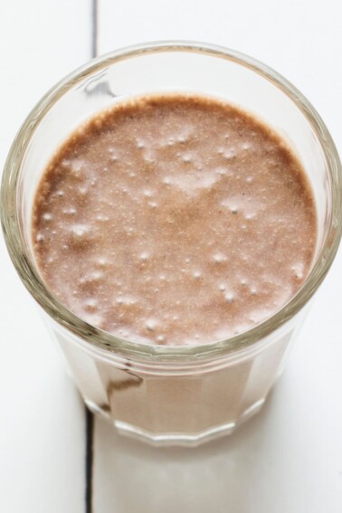 Coffee protein shake in a glass.