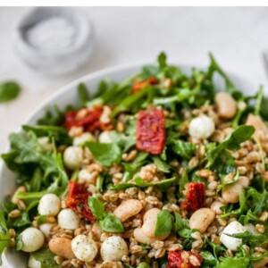 Farro arugula salad in a bowl.