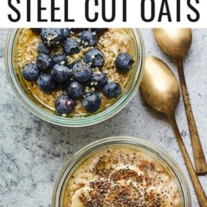 Two glass bowls of overnight steel cut oats. One it topped with blueberries and the other is topped with banana, maple and chia seeds.