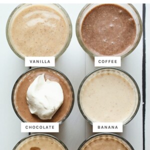 Bird's eye photo of 6 different protein shakes.