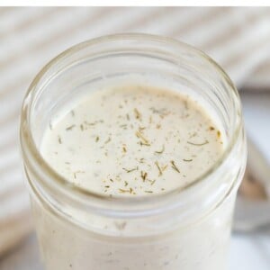 Jar of vegan ranch dressing.