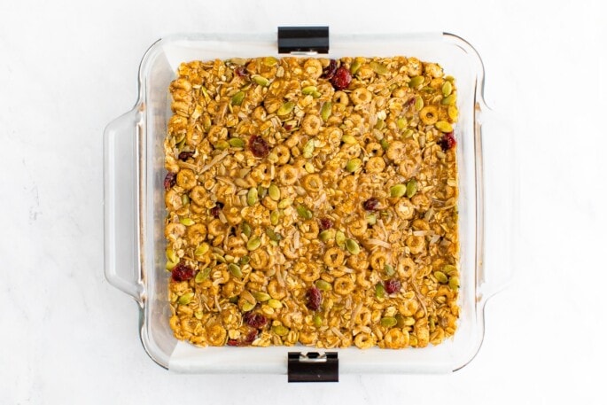 Cereal bars in a square dish.