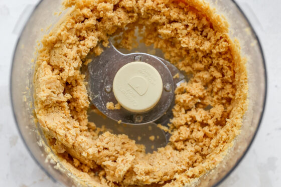 Processed chickpeas in a food processor.