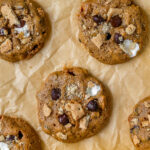 S'mores cookies on parchment paper.