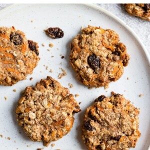 Plate with five carrot cake breakfast cookies on it.