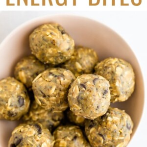 Energy bites made with sunbutter in a pink bowl.