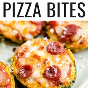 Zucchini pizza bite topped with pepperoni and red pepper.