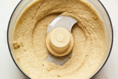 Chickpeas blended smooth in a food processor.