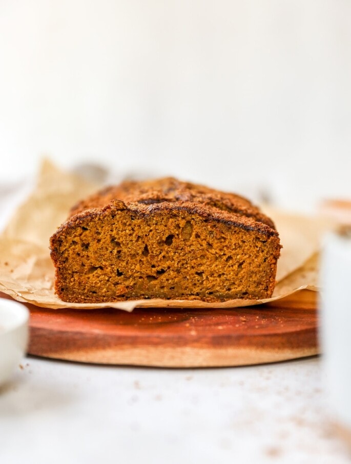 A close up shot of a slice of pumpkin bread.