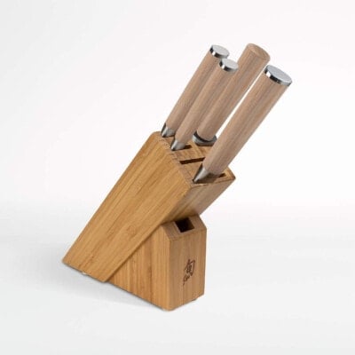 Wooden block holding 5 piece knife set