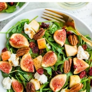 Arugula salad with goat cheese, pecans, dried cranberries and fresh figs.
