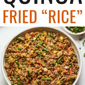 Serving bowl with quinoa fried "rice". Serving spoon is to the side.