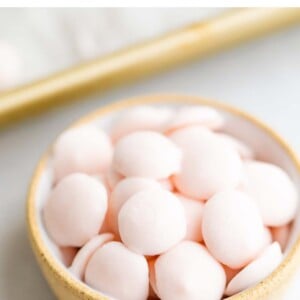 Bowl of baby yogurt melts-- frozen dots of strawberry yogurt.