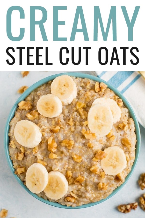 Bowl of steel cut oats topped with walnuts and banana slices.