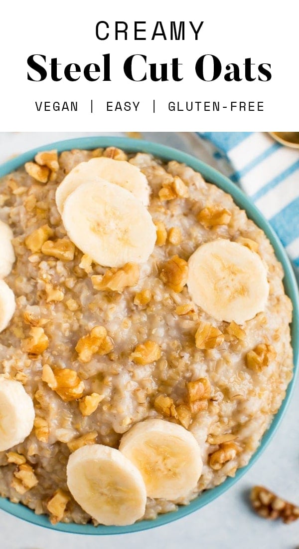 Bowl of steel cut oats topped with walnuts and banana slices.