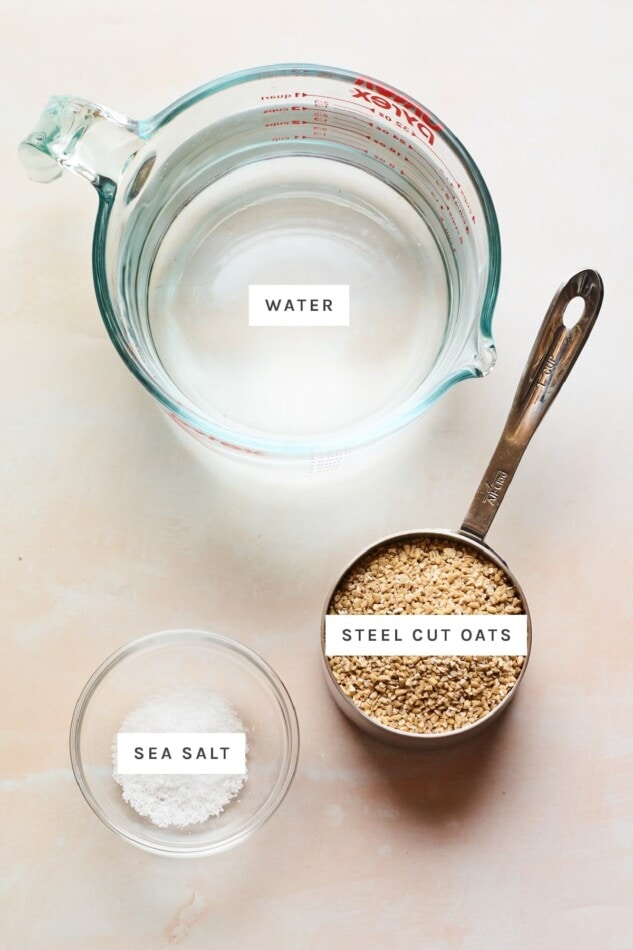 Ingredients measured out to make steel cut oats: water, steel cut oats and sea salt.